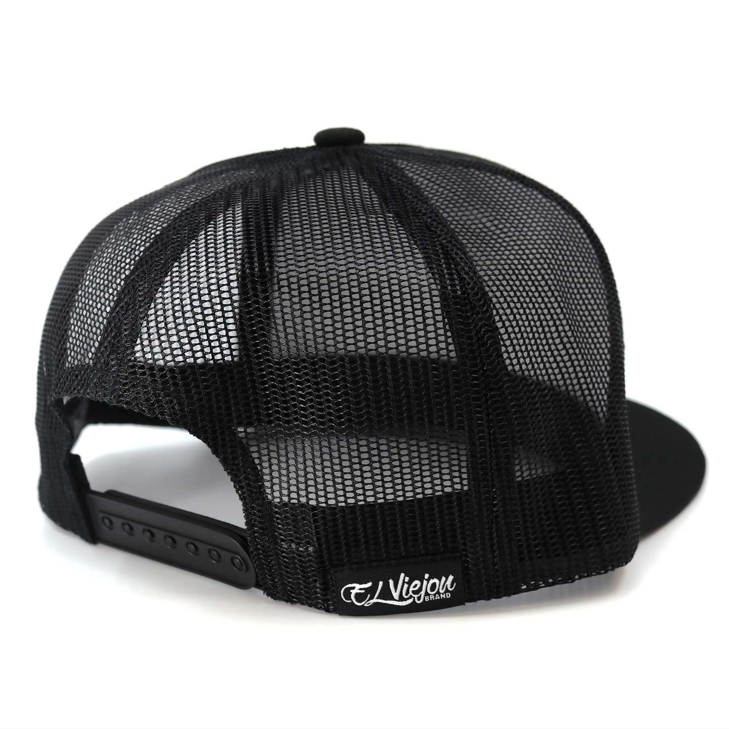Baraja De Oro Black flat visor trucker hat with black mesh, adjustable snapback, and "El Viejon Brand" tag.