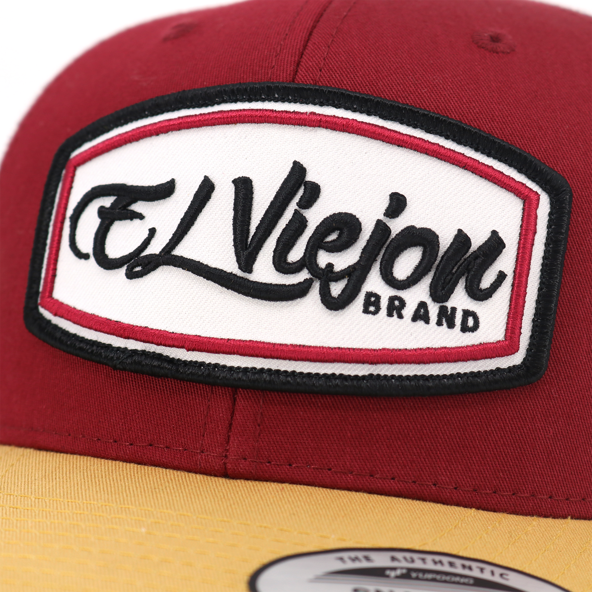 Ultra Tan/Maroon/White classic visor hat with "El Viejon Brand" embroidered patch.