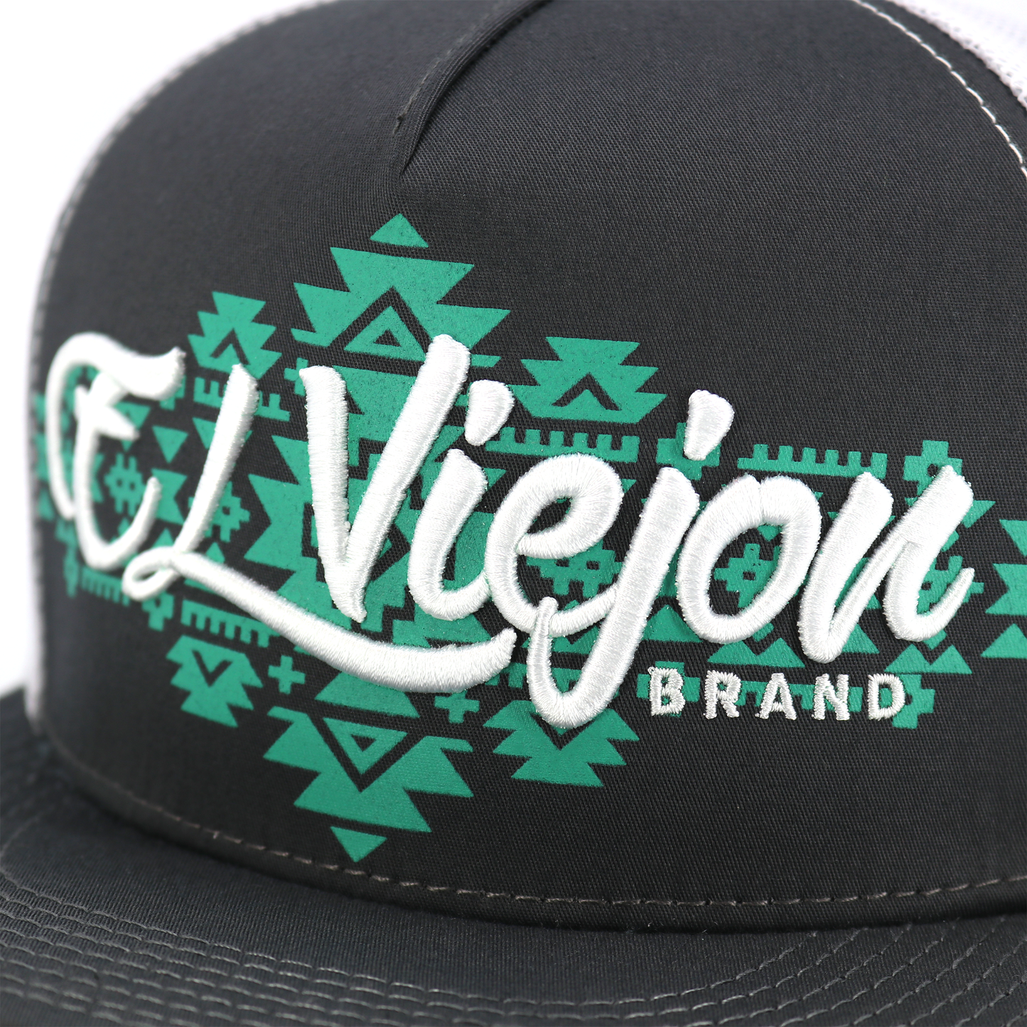 Yucca Charcoal/White flat visor hat with "El Viejon Brand" embroidered in white over a green geometric pattern.