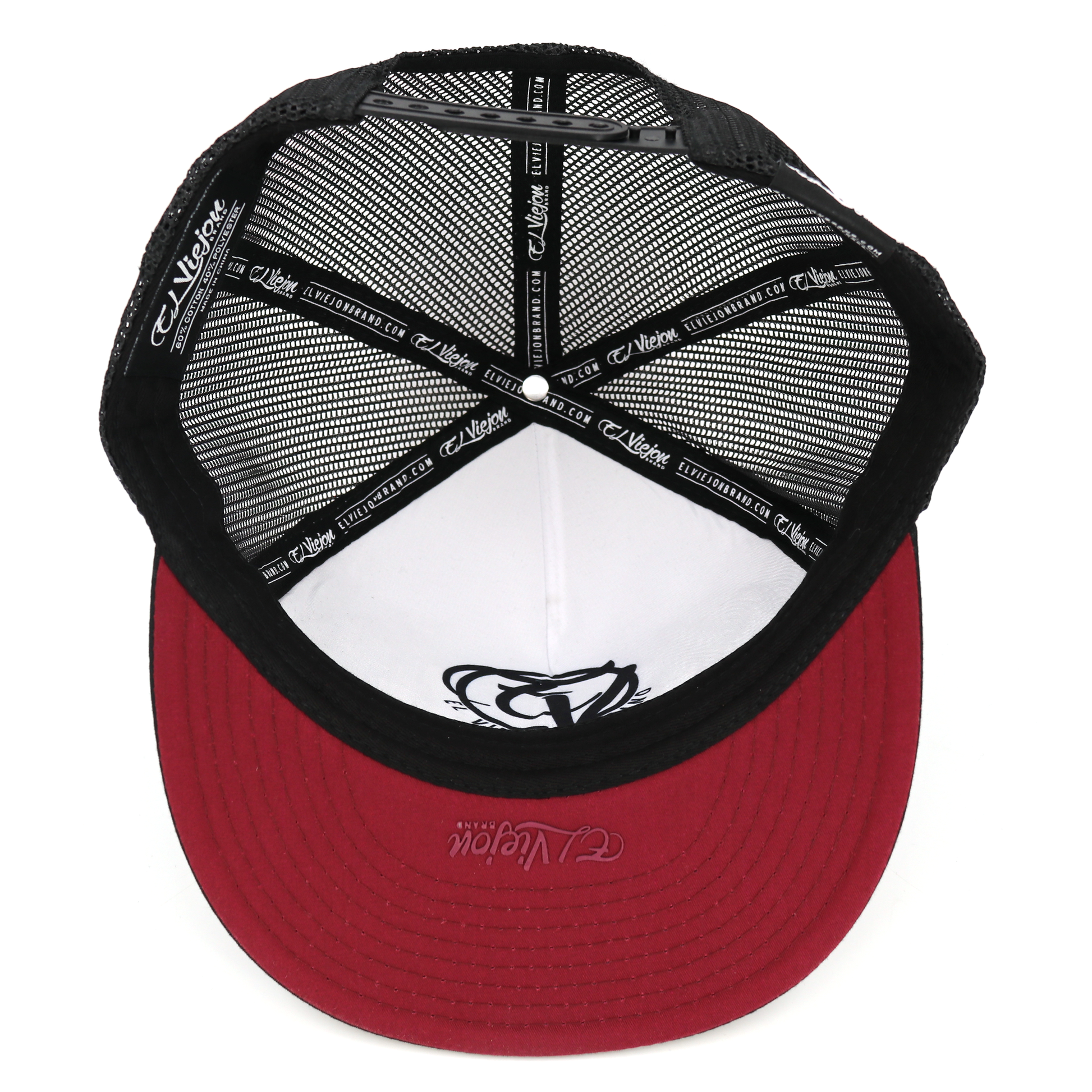 Nayarit Black flat visor hat with black mesh, red brim, and white interior.