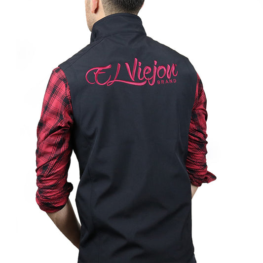 Black El Viejon Brand Vest with maroon logo, worn over a red plaid shirt, back view.