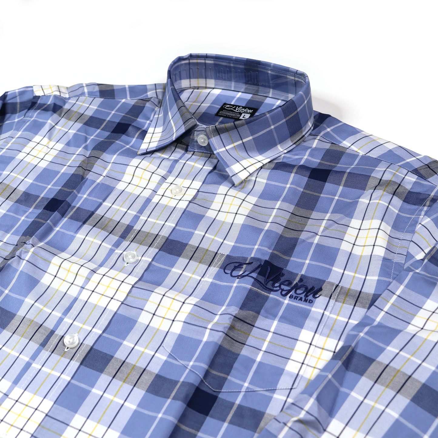 Men's blue, sky, and white plaid dress shirt with a straight collar, front pocket, and "El Viejon Brand" logo.