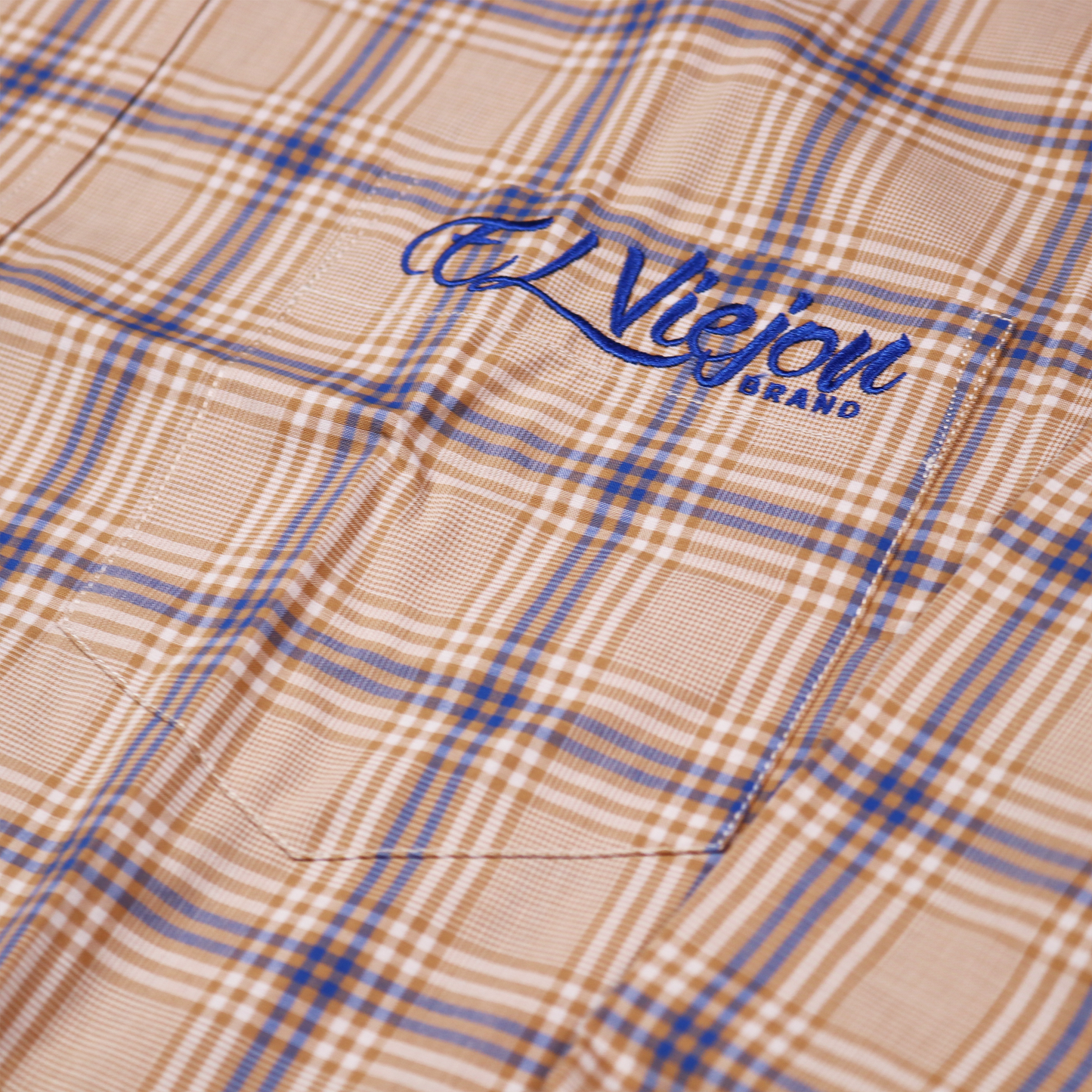 Khaki/tan/blue plaid dress shirt with front pocket and blue "El Viejon Brand" embroidered logo.
