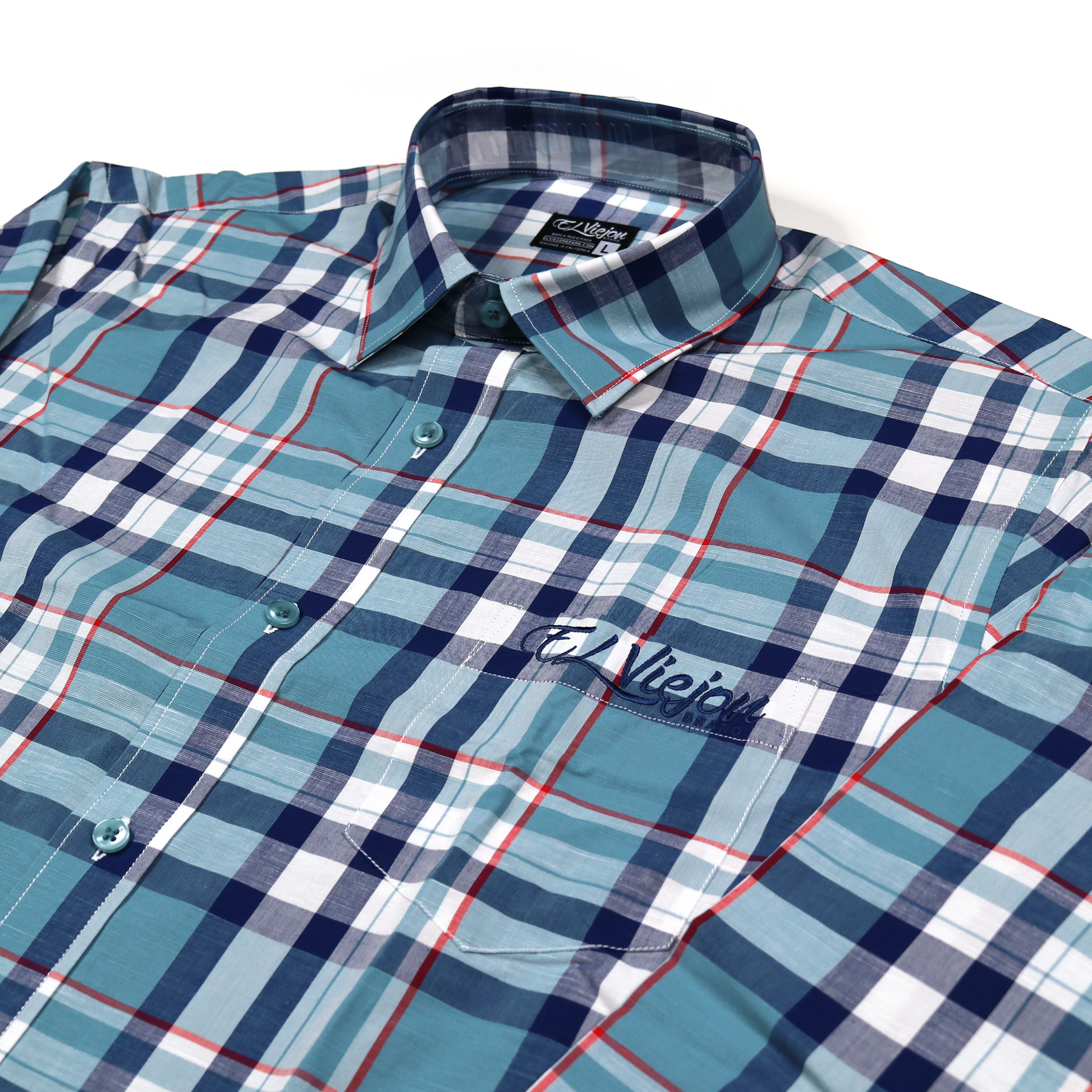 Men's plaid dress shirt in teal, navy, red, and white with El Viejon logo and front pocket.