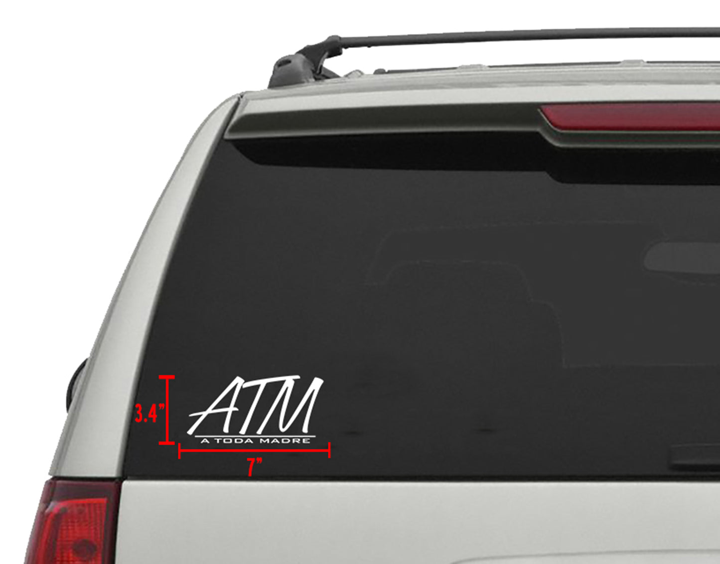 White "ATM A TODA MADRE" die-cut vinyl decal, 7"x3.4", applied to a vehicle's rear window.