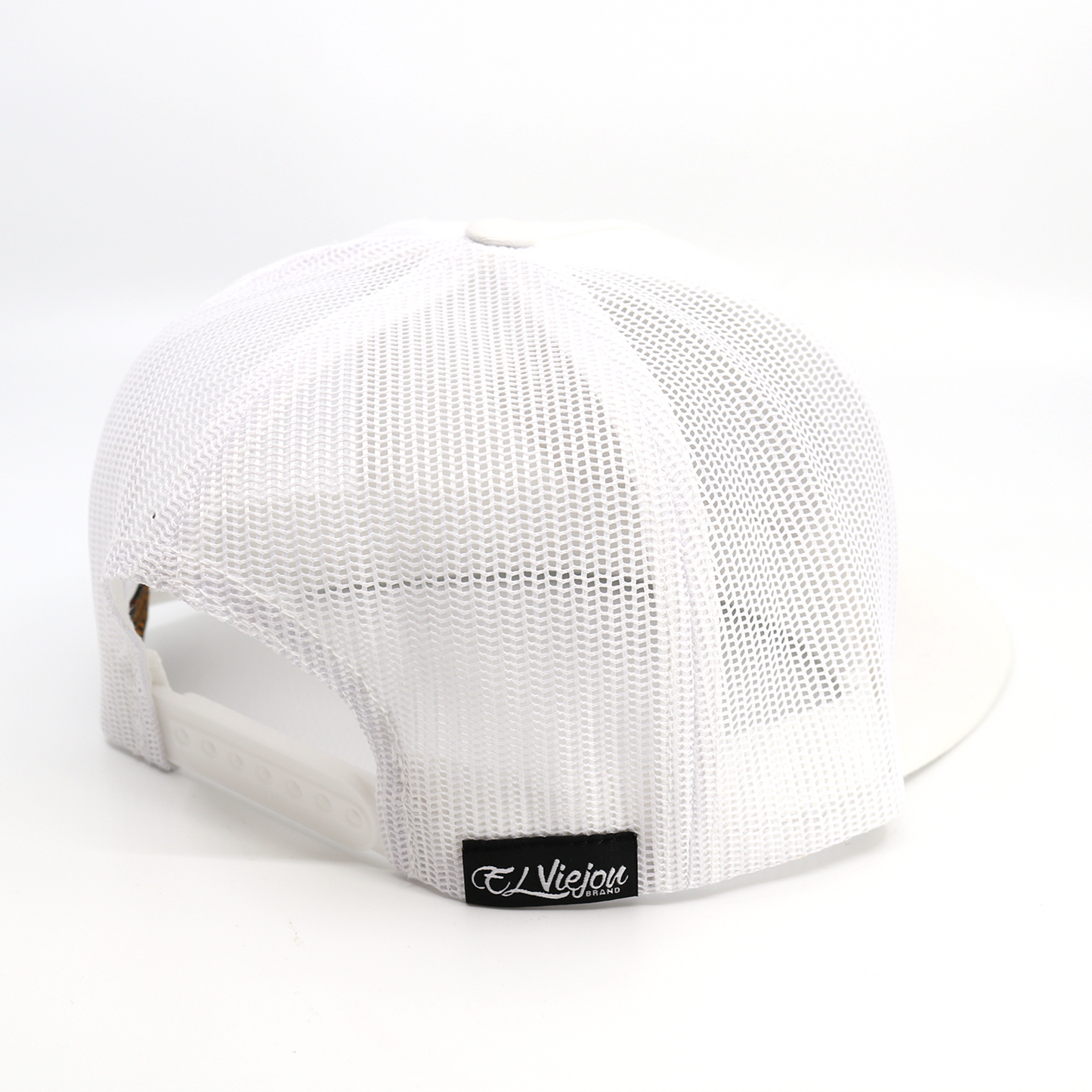 El Cente White Yupoong Classic trucker hat with white mesh, flat visor, and adjustable snapback.