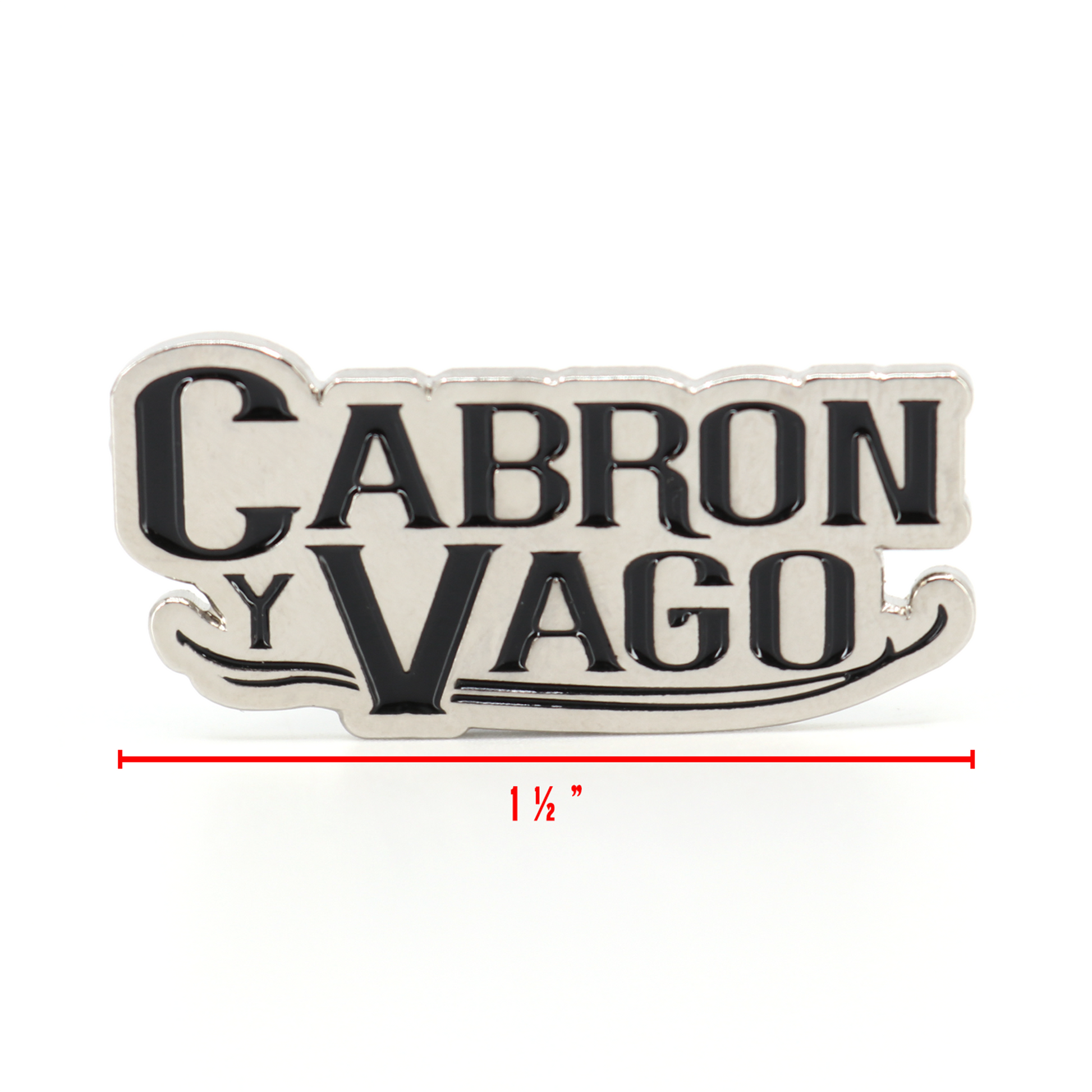Silver metal "Cabron y Vago" pin with black enamel lettering, 1.5 inches wide.