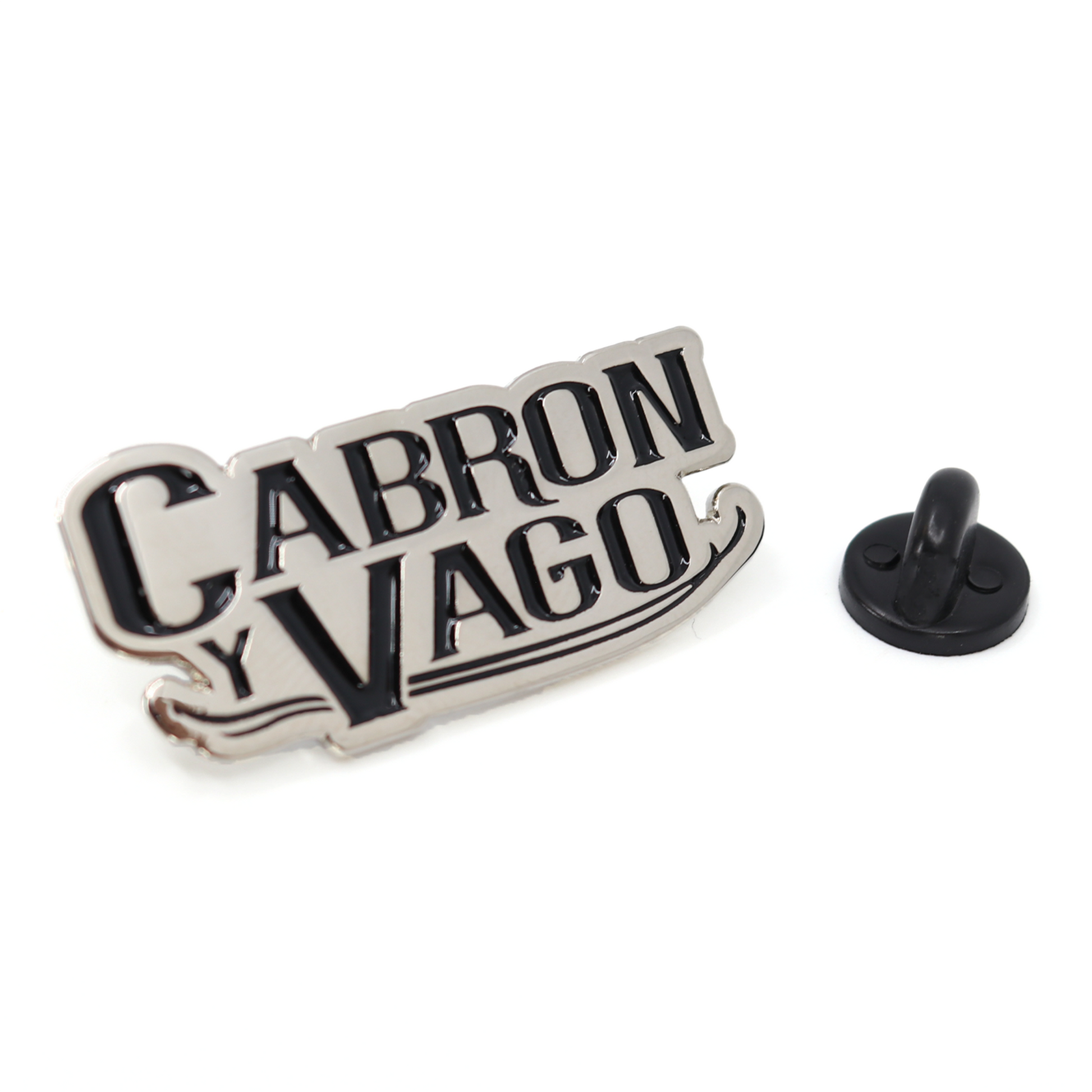 Silver "Cabron y Vago" metal pin with black enamel lettering and a black rubber clutch.