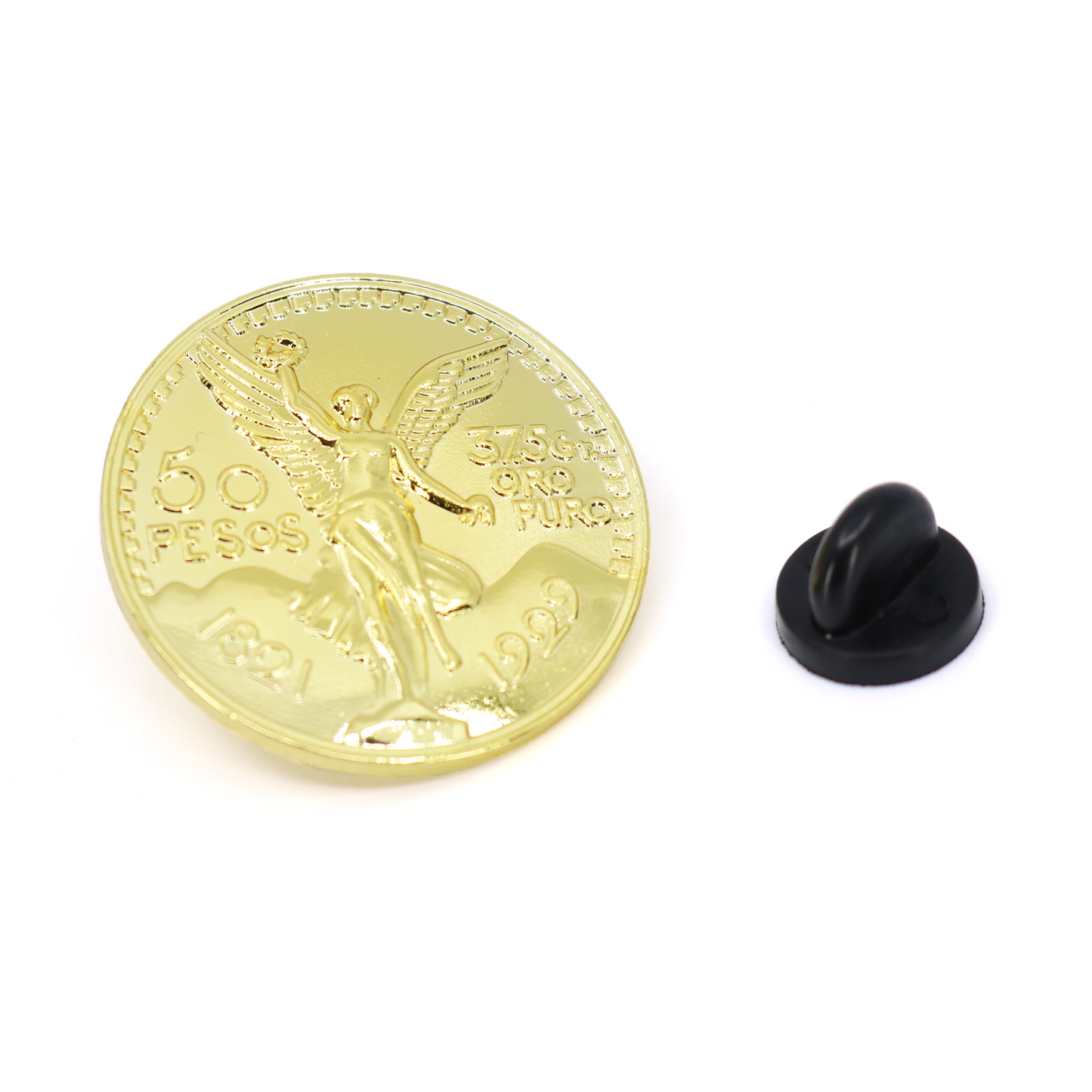 Shiny gold El Cente pin, coin-shaped with an angel design, beside a black rubber clutch.