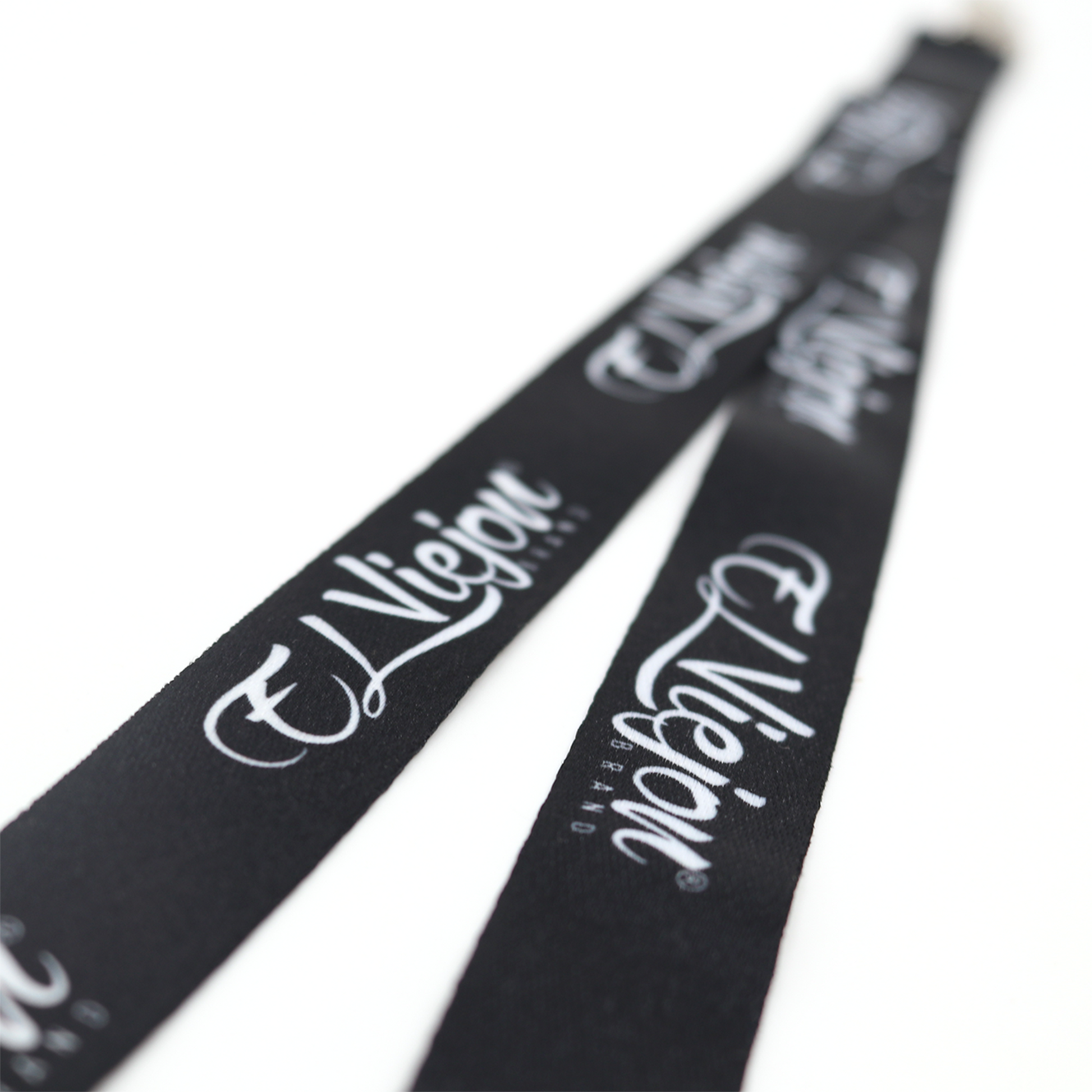 Black fabric lanyard with "El Viejon Brand" logo in white script, featuring a metal clip.