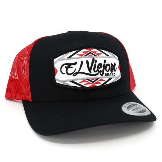 Navajo Black/Red Yupoong Classic trucker hat with "El Viejon Brand" patch and geometric design.