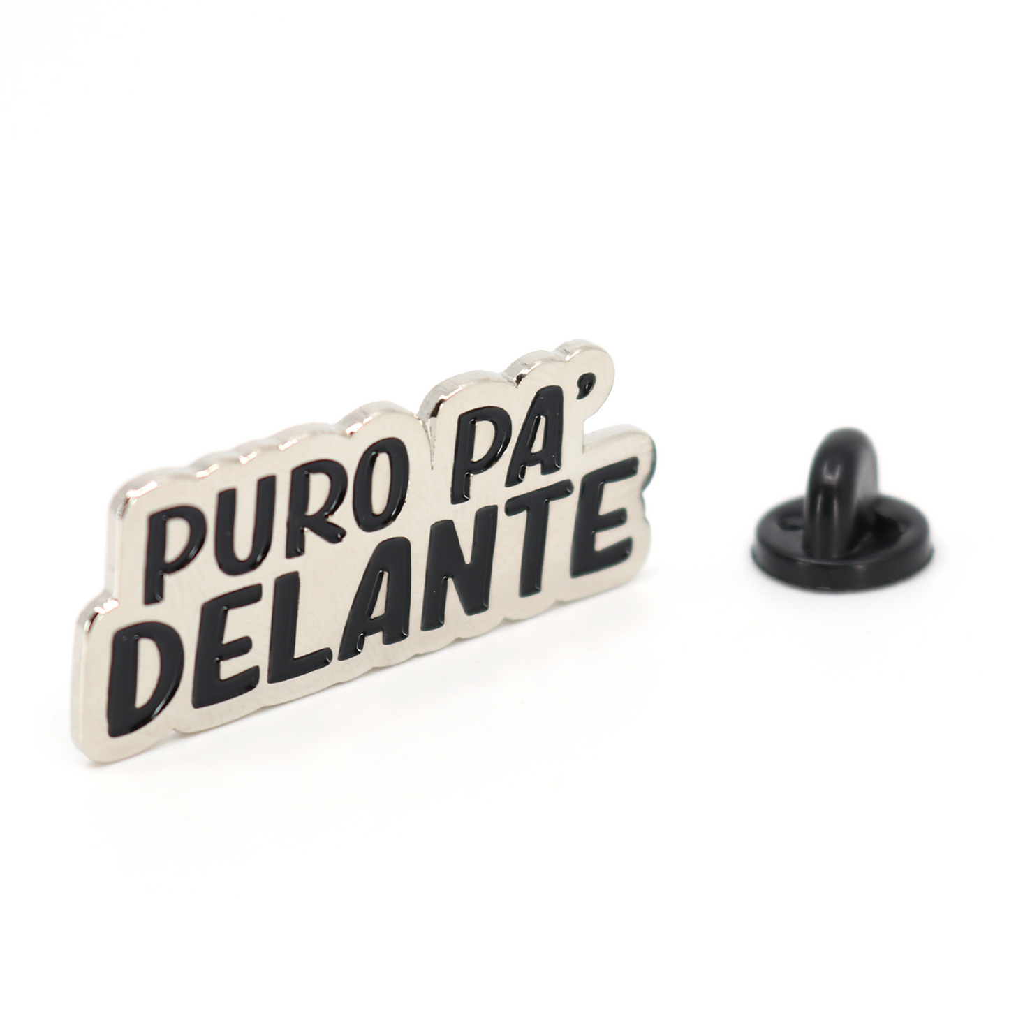 Silver "Puro Pa Delante" enamel pin with black lettering and a separate black rubber clutch.