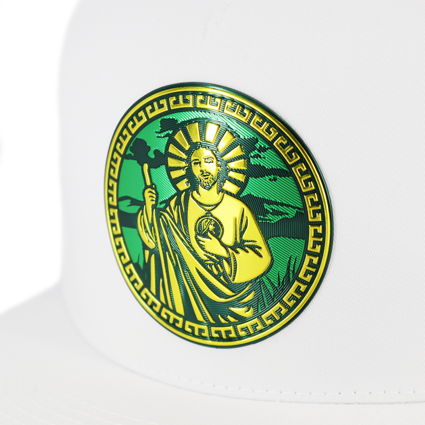White Yupoong trucker hat with a green and gold San Judas Tadeo emblem.