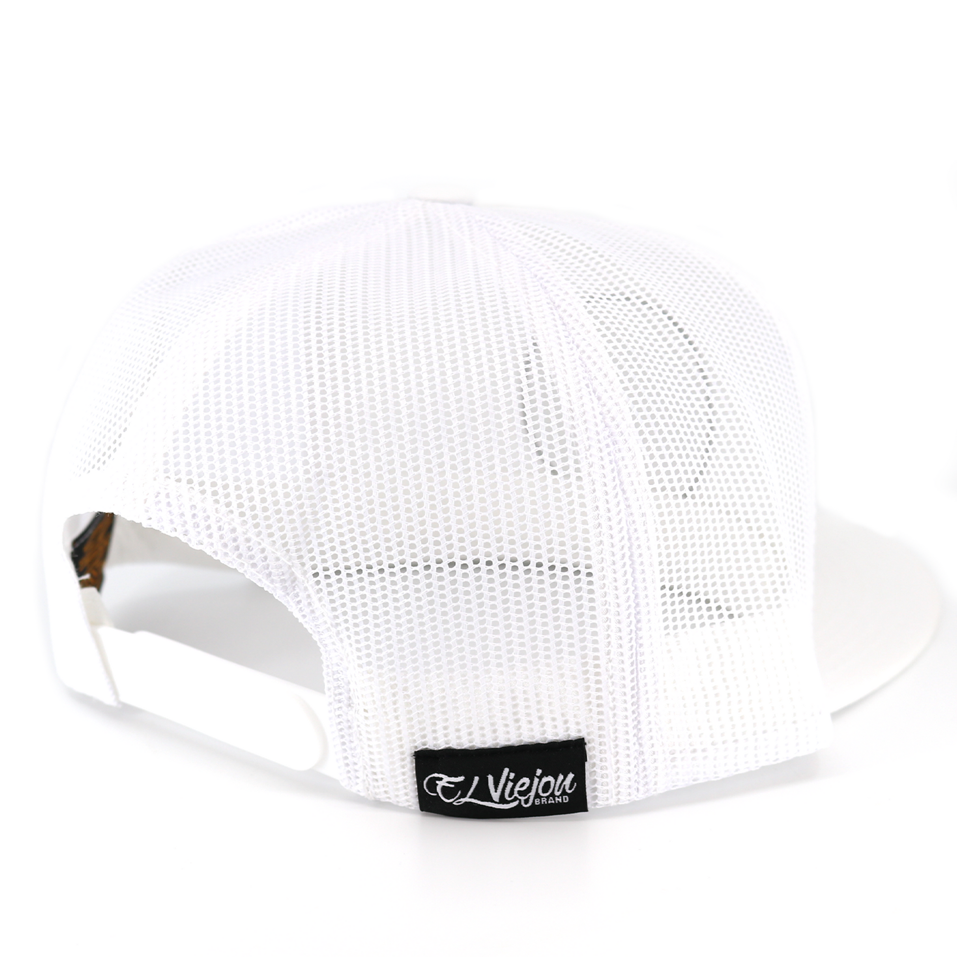 White Yupoong Classic trucker hat, rear view, with white mesh back and black "El Viejon Brand" tag.